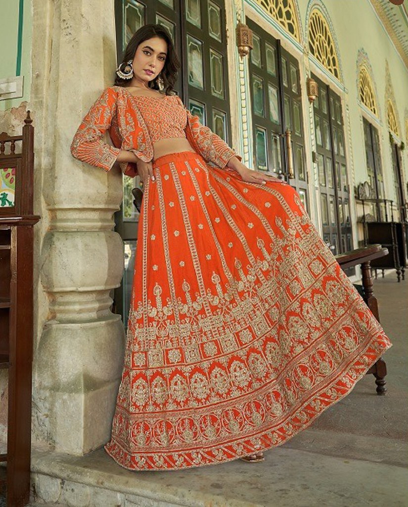 Varnika Collection Orange Lehenga Choli