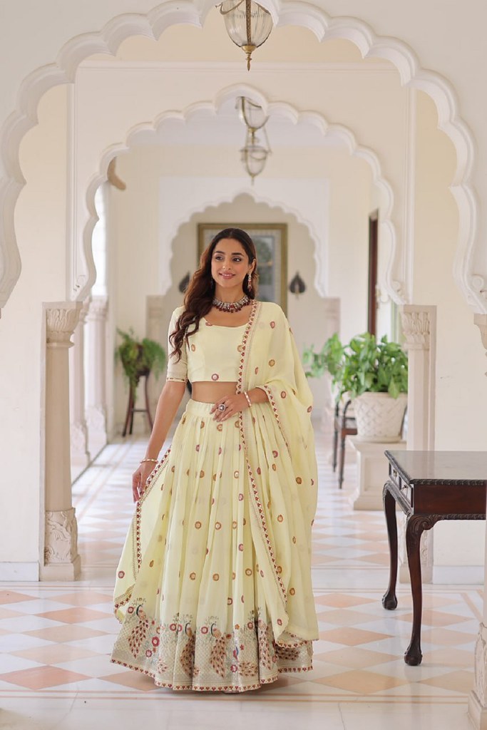 IvorySpectrum Silk Lehengas Cream
