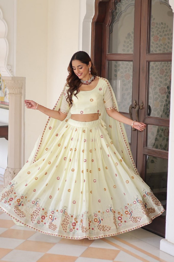 IvorySpectrum Silk Lehengas Cream