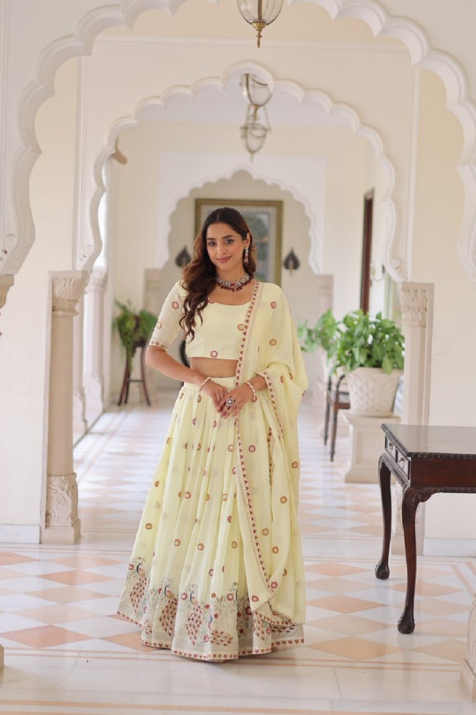 IvorySpectrum Silk Lehengas Cream